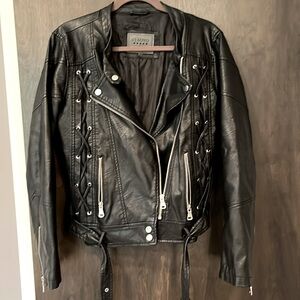 Beautiful worn in faux leather jacket